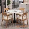 Bo-ban-cafe-tiep-khach-mat-da-4-ghe-go